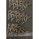 Seven pairs of heavy duty cast metal wall brackets suitable for indoor or outdoor use. 26cm along