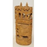 Carved wooden piece featuring elephants and other wild animals. Approx 45cm tall
