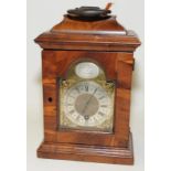 Antique walnut bracket clock. Clock face signed John Pyke London. Appears to have later Smiths