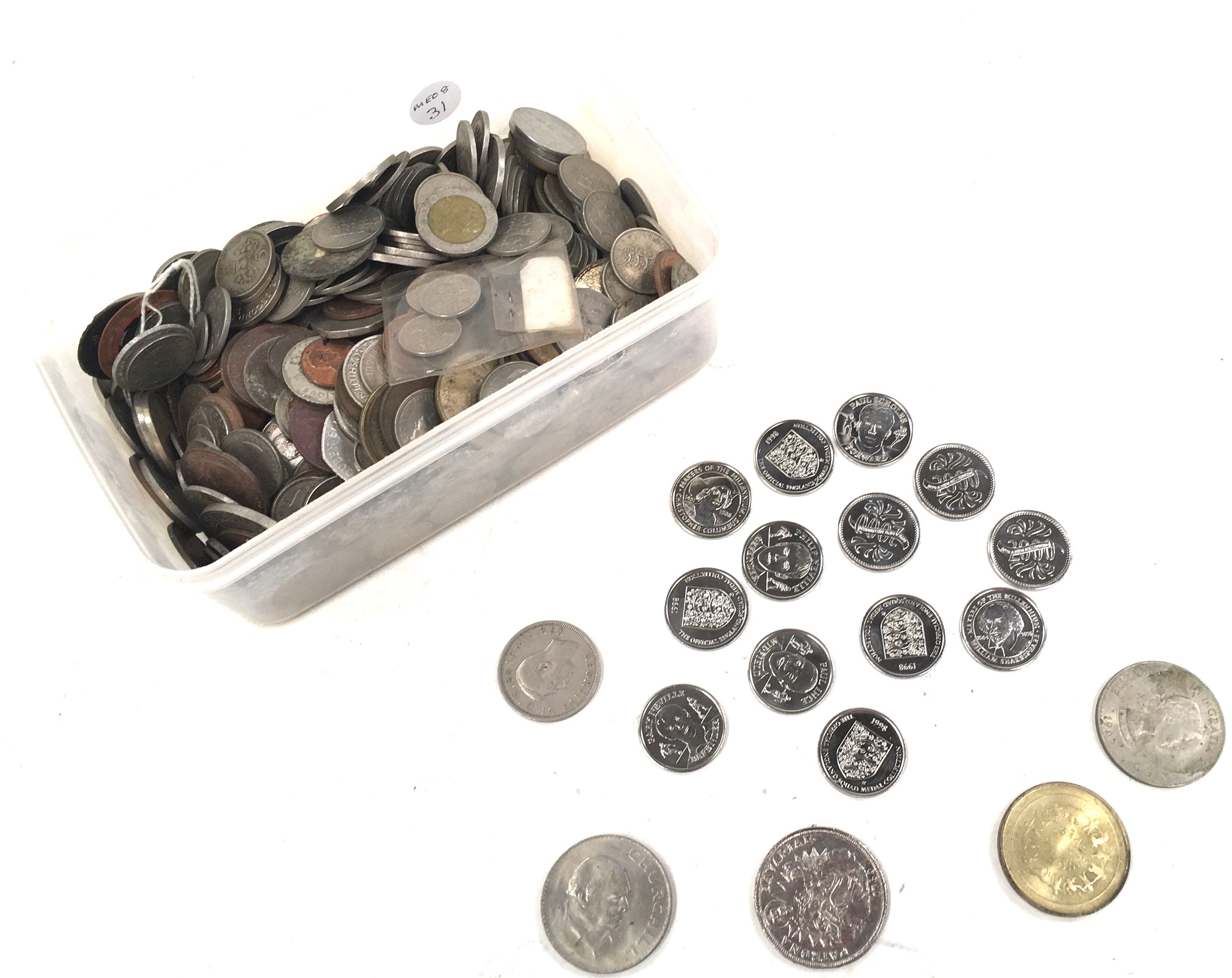 A box of various coins.