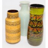 Three decorative vases to include a Poole Pottery Aegean example as well as West German Hot Lava and