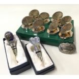 Set of 8 silver plated place settings in the form of scallop shells c/w two boxed wine bottle