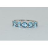 A 925 silver and five stone aquamarine ring Size O