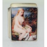 A silver pill box with nude enamel panel to lid.