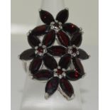 A huge 925 silver and garnet flower ring Size O