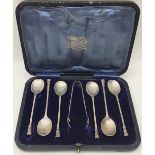 Silver teaspoons and tongs set in original case