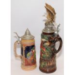 Two large decorative ceramic and pewter steins largest 45cm tall