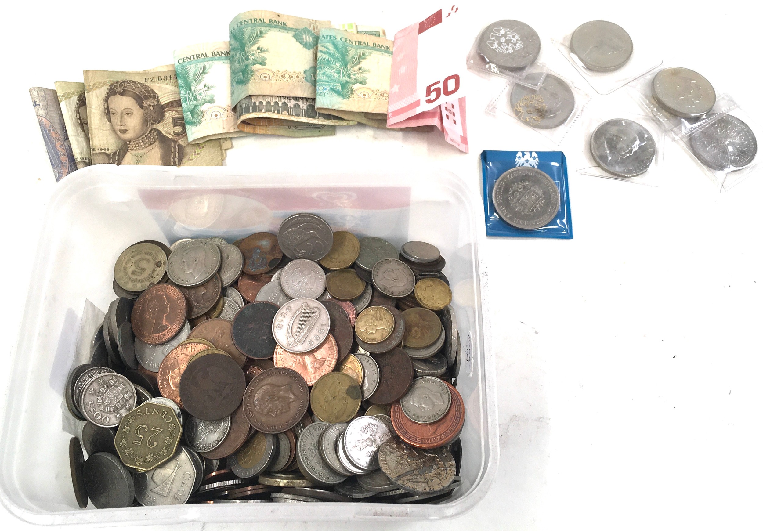 A box of various coins.