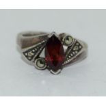 A Marcasite and garnet 925 silver ring Size L