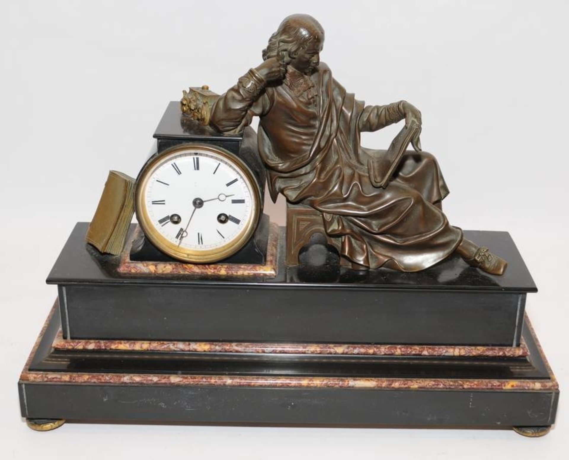 Large French striking mantle clock featuring a bronze figure upon a marble plinth. O/all 44.5cm