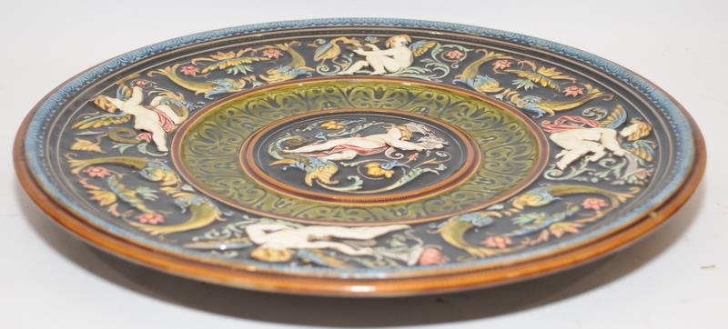 A majolica style plate with cherubs, 37cm diameter. - Image 2 of 3