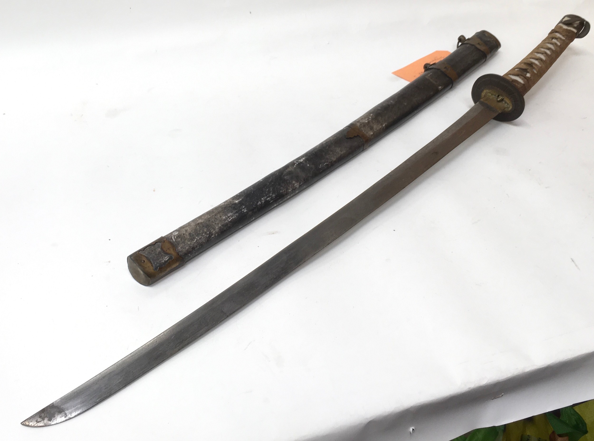 WWII Japanese Officers sword including leather scabbard with brass decoration and a ray skin and - Image 6 of 7
