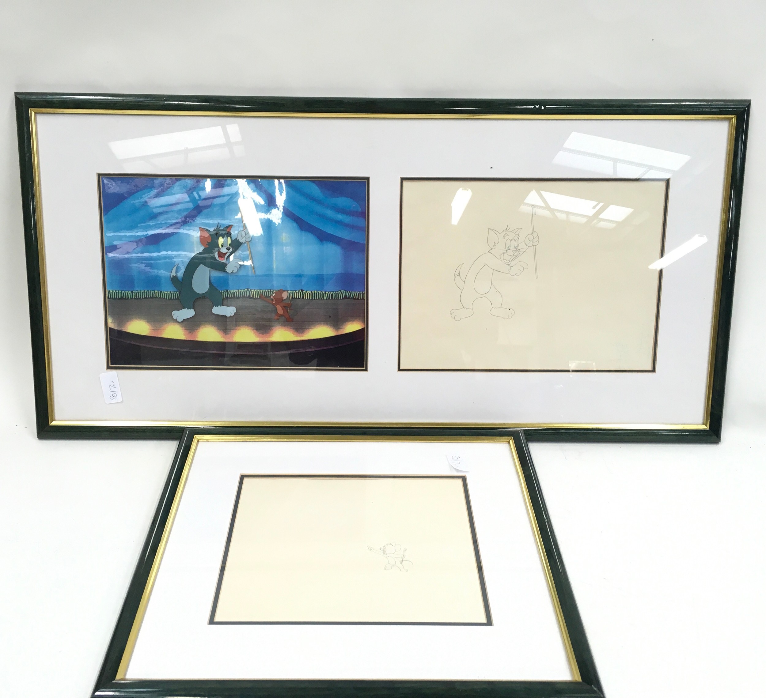 Pair of framed original Tom And Jerry animation art production cells / serigraphic cells. O/all