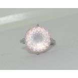 A large rose quartz 925 silver ring. Size N