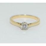 A Diamond solitaire 0.25 point 9ct gold ring, Size N