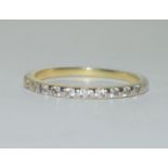 An Elanza 925 silver thin half eternity ring, Size V