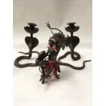 Spelter Indian ornament together with 2 snake candlesticks (120).