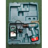 Makita 6227D electric power drill in case with Makita DC1470 charger.