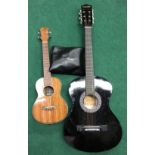 Caramel ukulele together with Display4Top acoustic guitar.