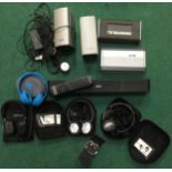 Collection of Bose Speakers and headphones and a pair of beats headphones. WP.