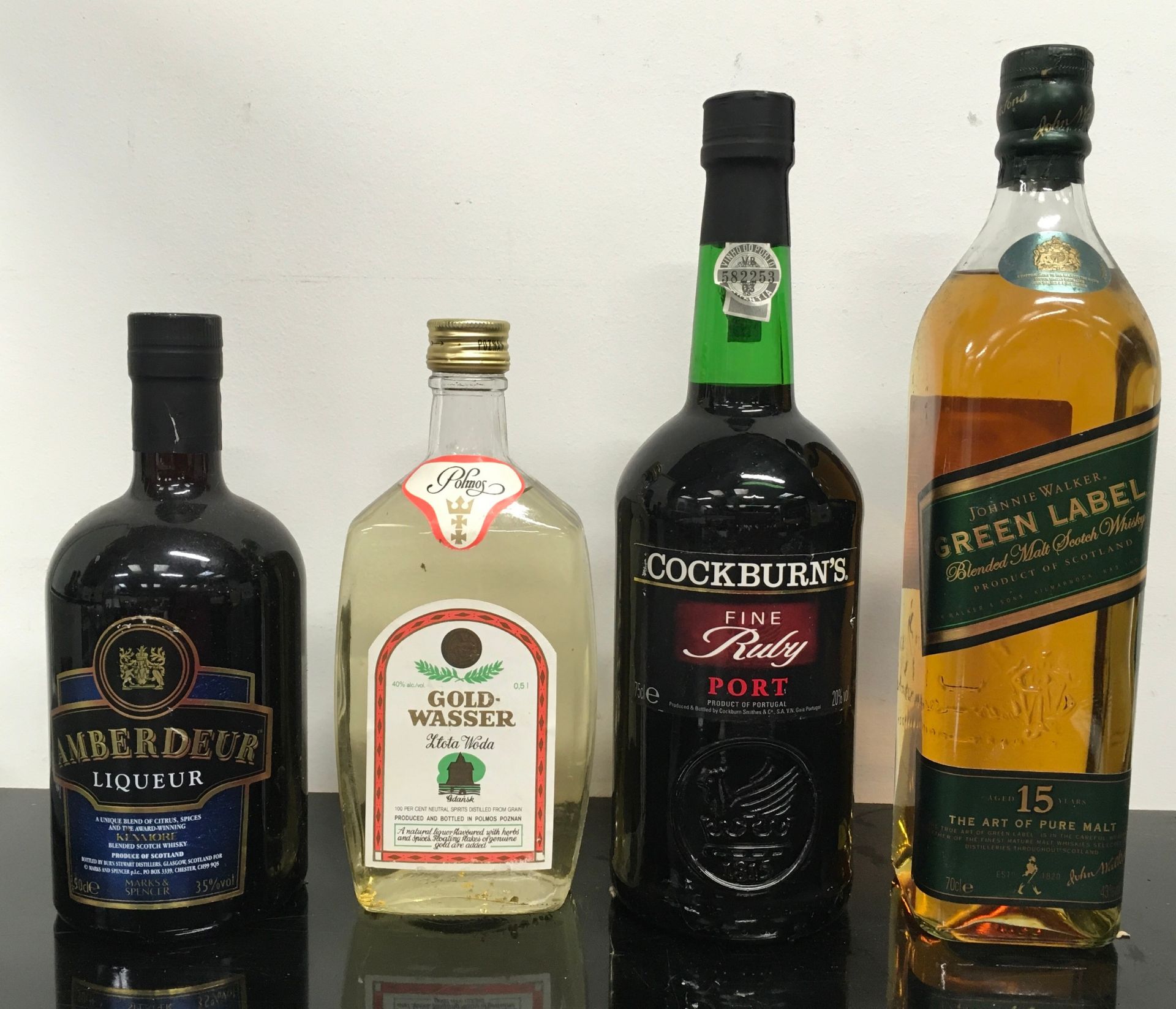 4 bottles of alcohol: Johnnie Walker Green Label Scotch Whiskey 700ml, Amberdeur Liqueur 500ml, Gold