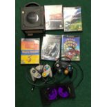 Nintendo GameCube consoles with games and controller. WP.