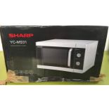 Boxed Sharp microwave (not tested).