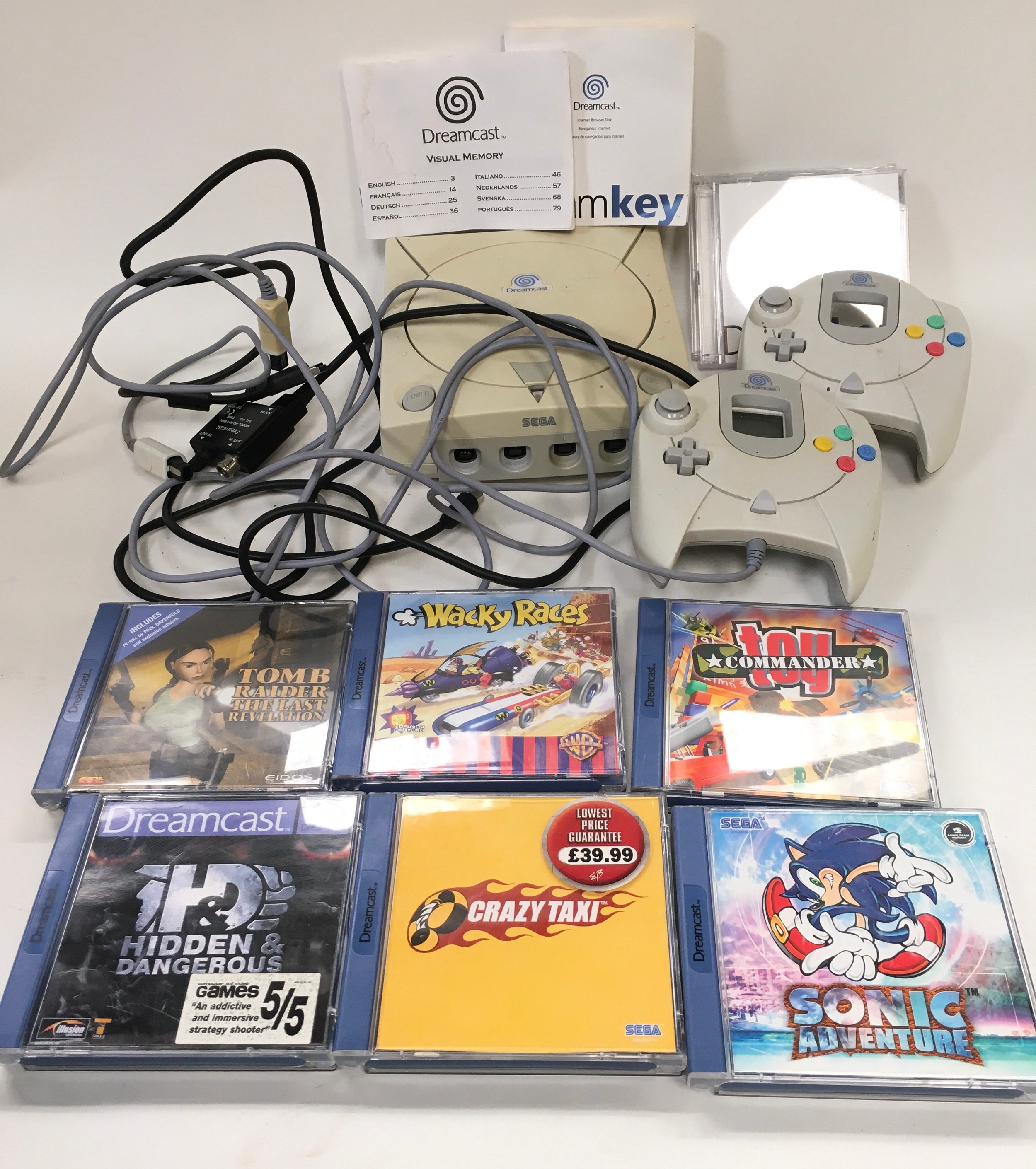 Sega Dreamcast games console with controller ps and games. WP.