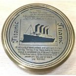 A Titanic pocket compass. (139)