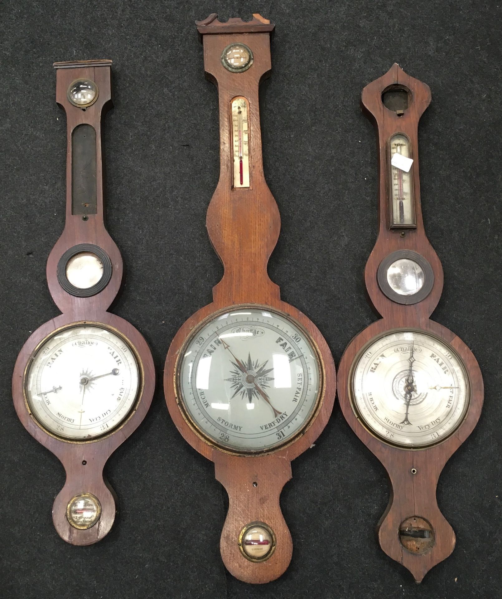 Collection of three vintage banjo barometers.