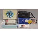 Polaroid vision instant camera & solar slide viewer.