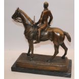 A Bronze figure of horse and rider on marble based signed.