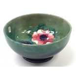 A Moorcroft Pottery bowl, pansy design, impressed marks to base.