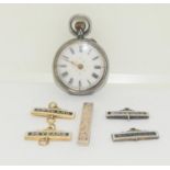 Silver pocket watch with silver St Johns Ambulance badges/service bars.