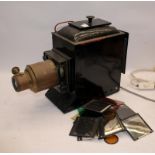 Vintage magic lantern plus a number of slides and filters