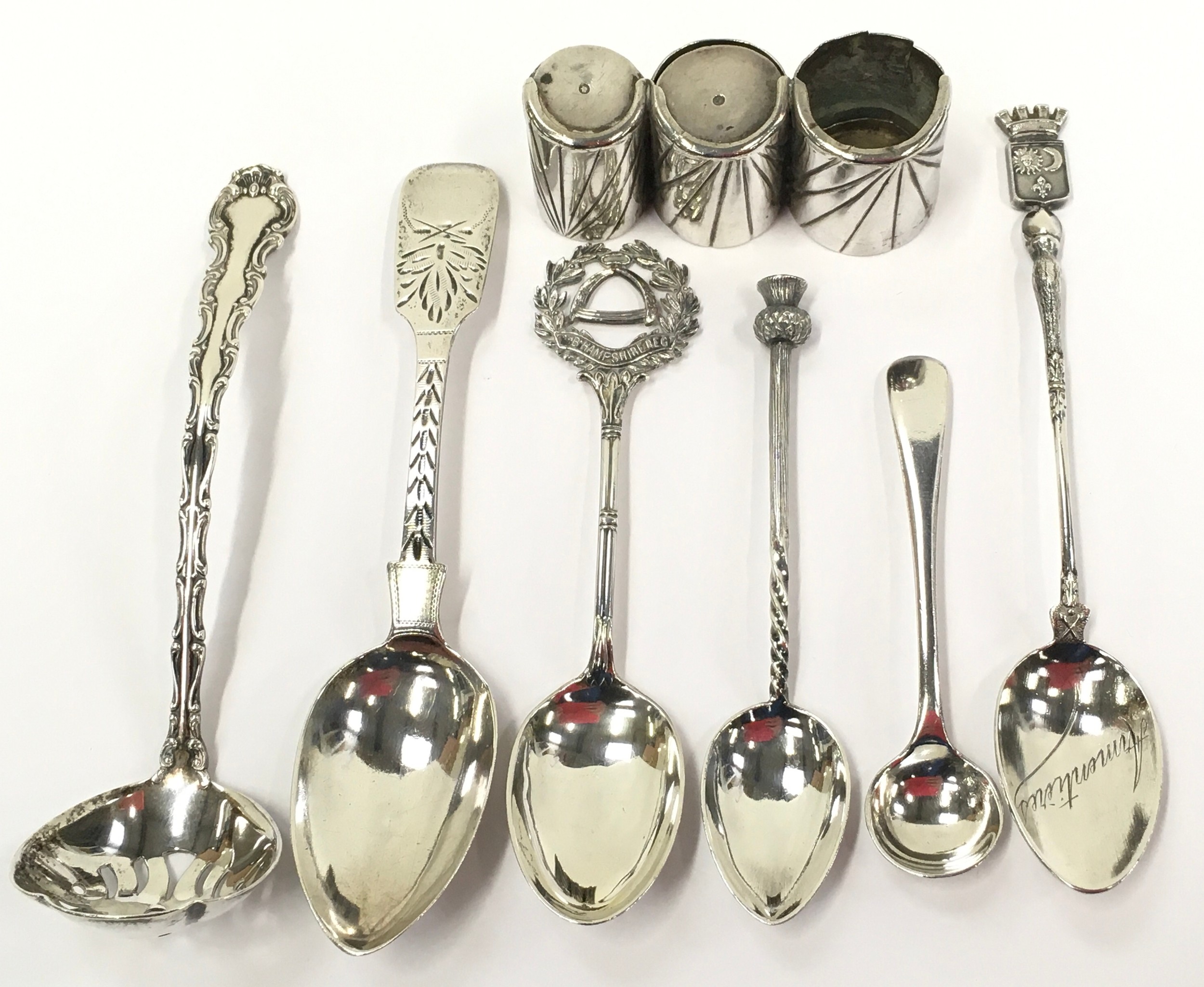 Mix silver items to include a draining spoon