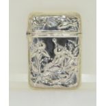 A Silver Vesta case with embossed decoration.