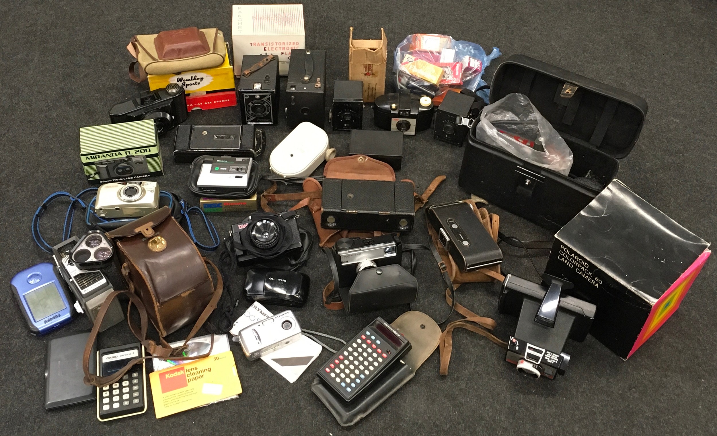 Large collection of vintage cameras, camera equipment and cine cameras to include Olympus, Kodak
