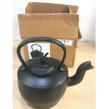 Cast iron kettle. (154)