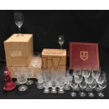 Large collection of boxed and unboxed cut crystal and clear drinking glasses to include a boxed