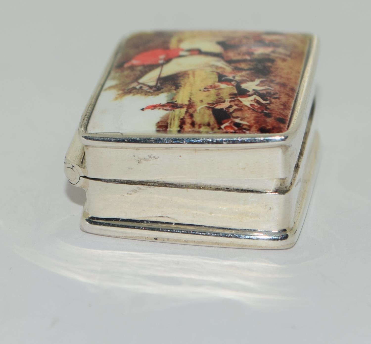 A Silver enamel pill box with enamel decoration. - Image 2 of 3