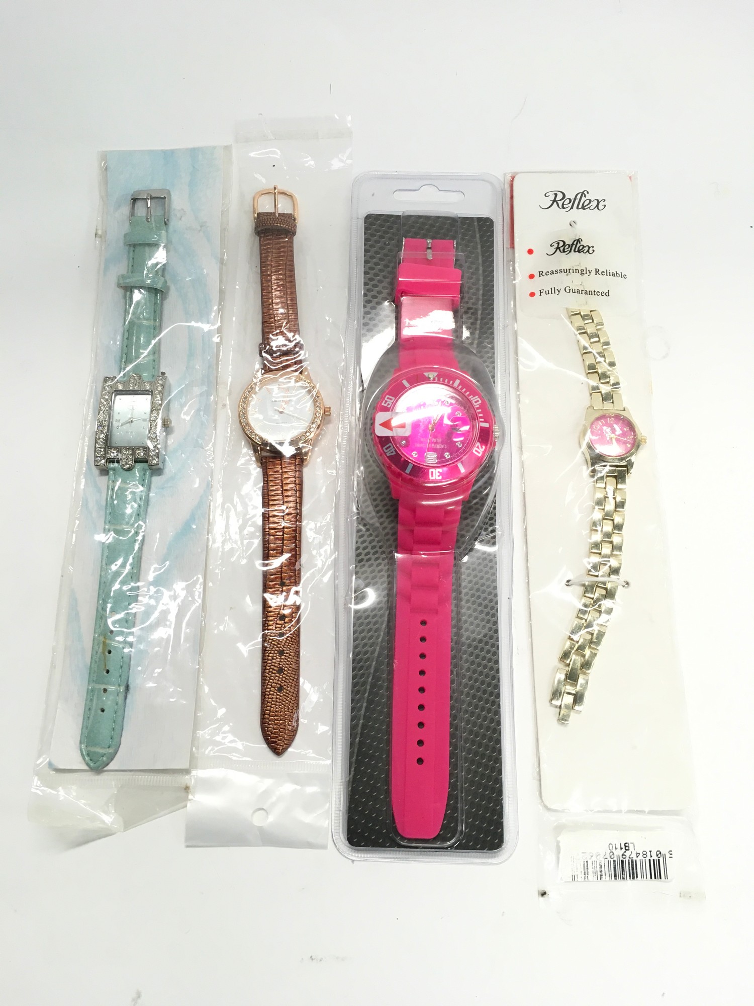 Four ladies watches, as new, still in packaging.