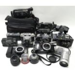 Box of vintage cameras and lenses