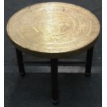 Brass topped Islamic folding table with removable top 47cm tall 60cm diameter.