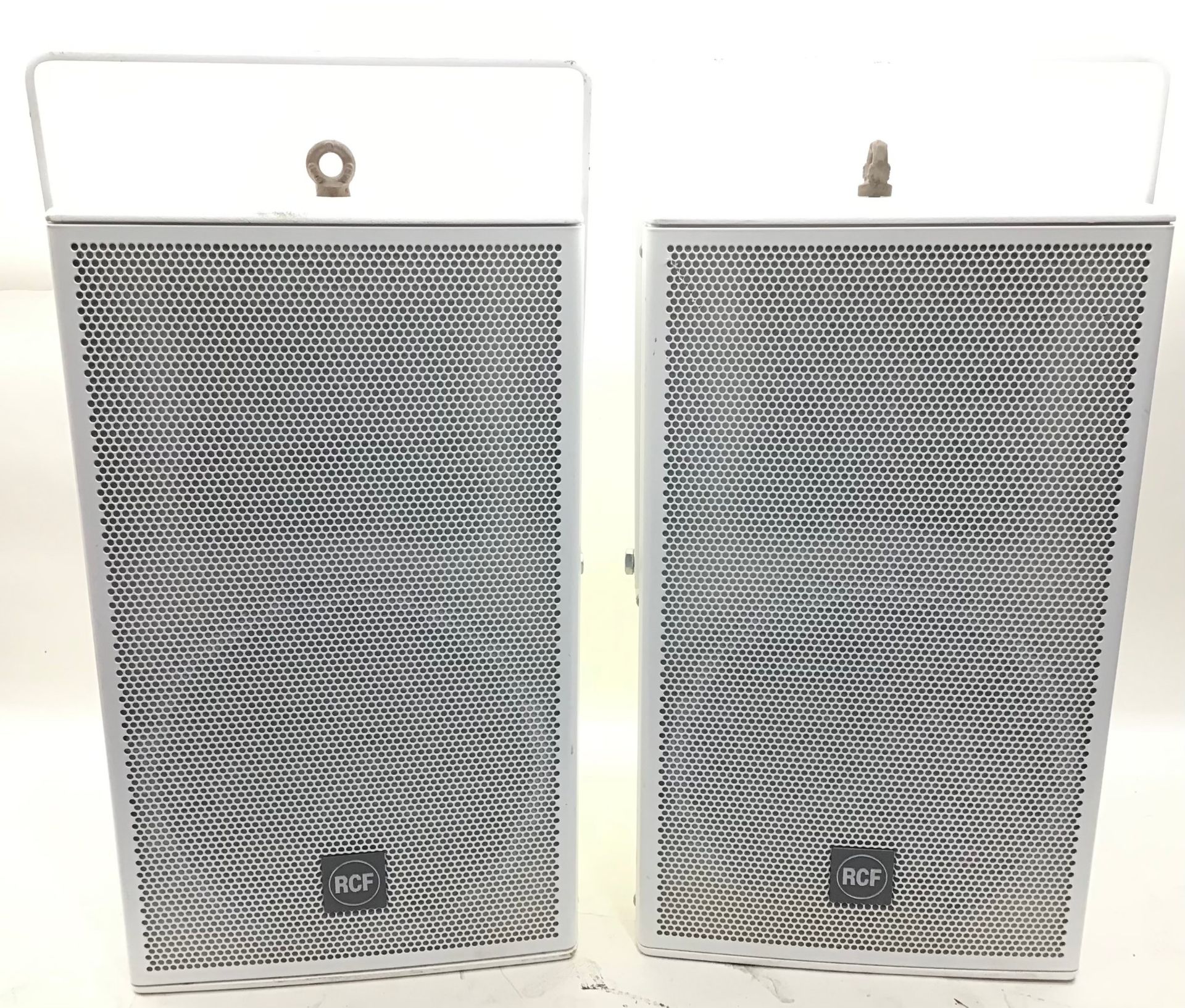 RCF COMPACT SERIES SPEAKERS. Here we have a pair of Acustica C3110 speakers with hanging brackets.