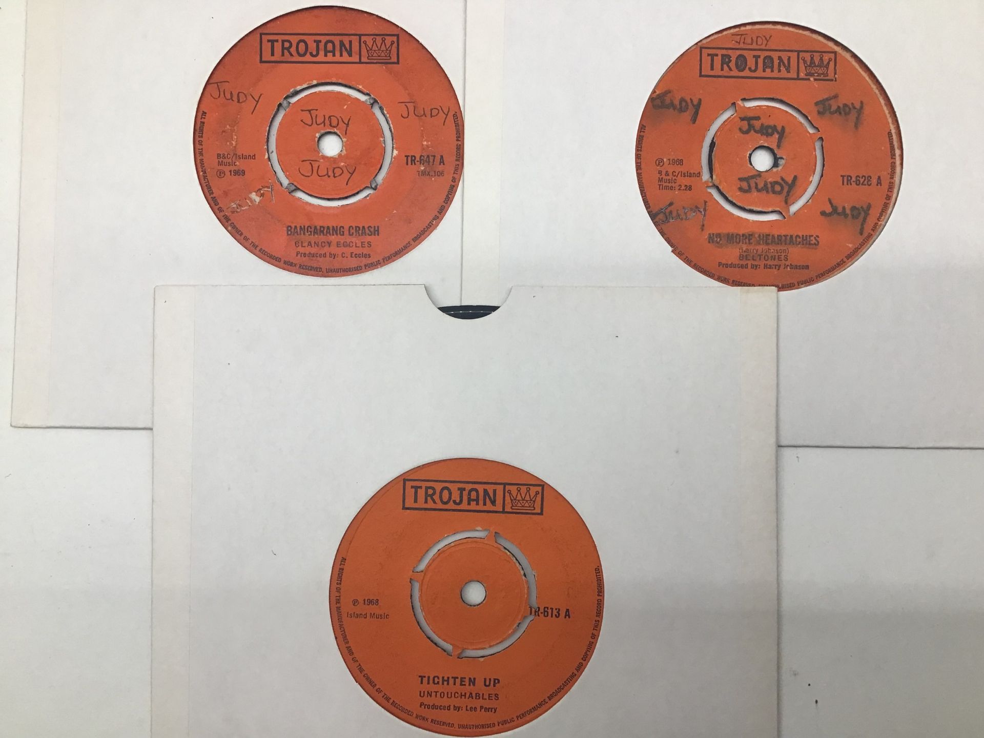 3 VINTAGE 60’s TROJAN REGGAE SINGLE RECORDS. Artists here include - Clancy Eccles (VG) -