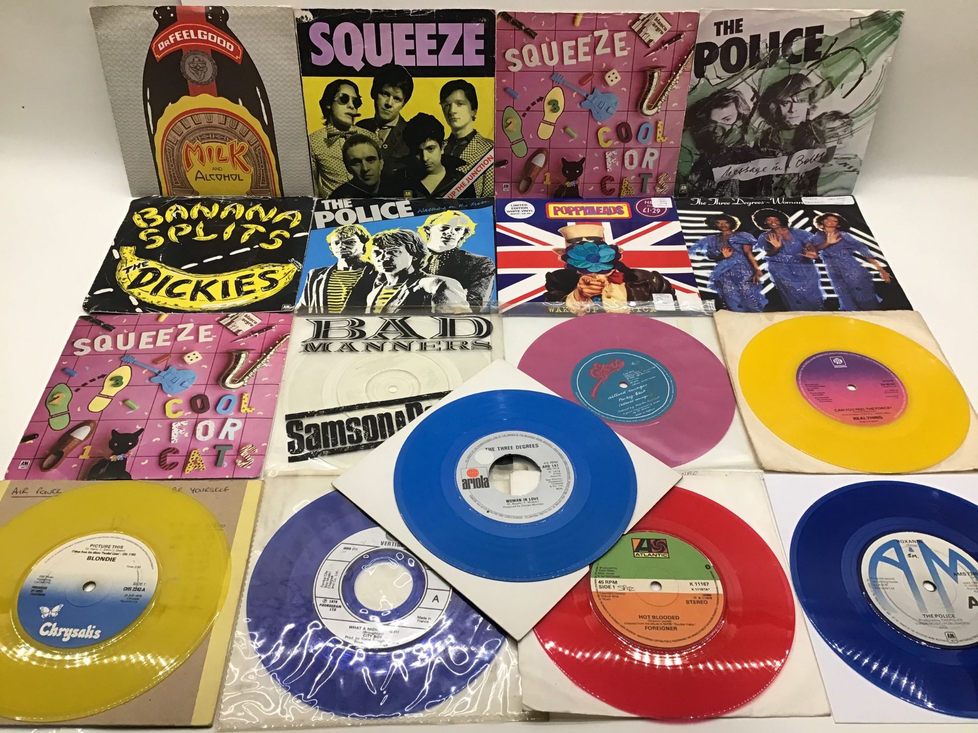 COLLECTION OF COLOURED SINGLE VINYL RECORDS. Great selection with artists to include - Real