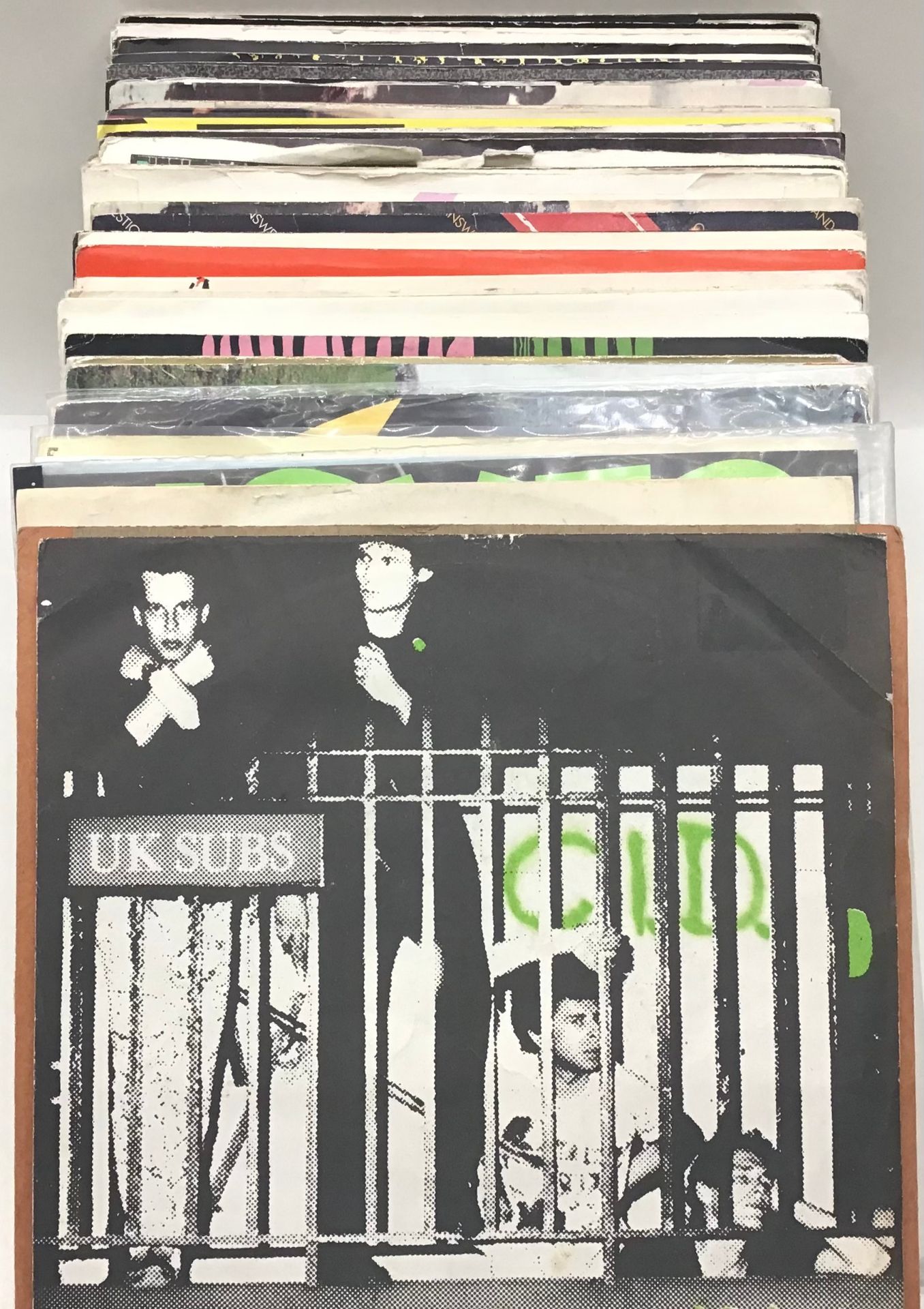 48 PUNK RELATED VINYL 7” SINGLES. This set has artists to include - The Sex Pistols - Skids - The