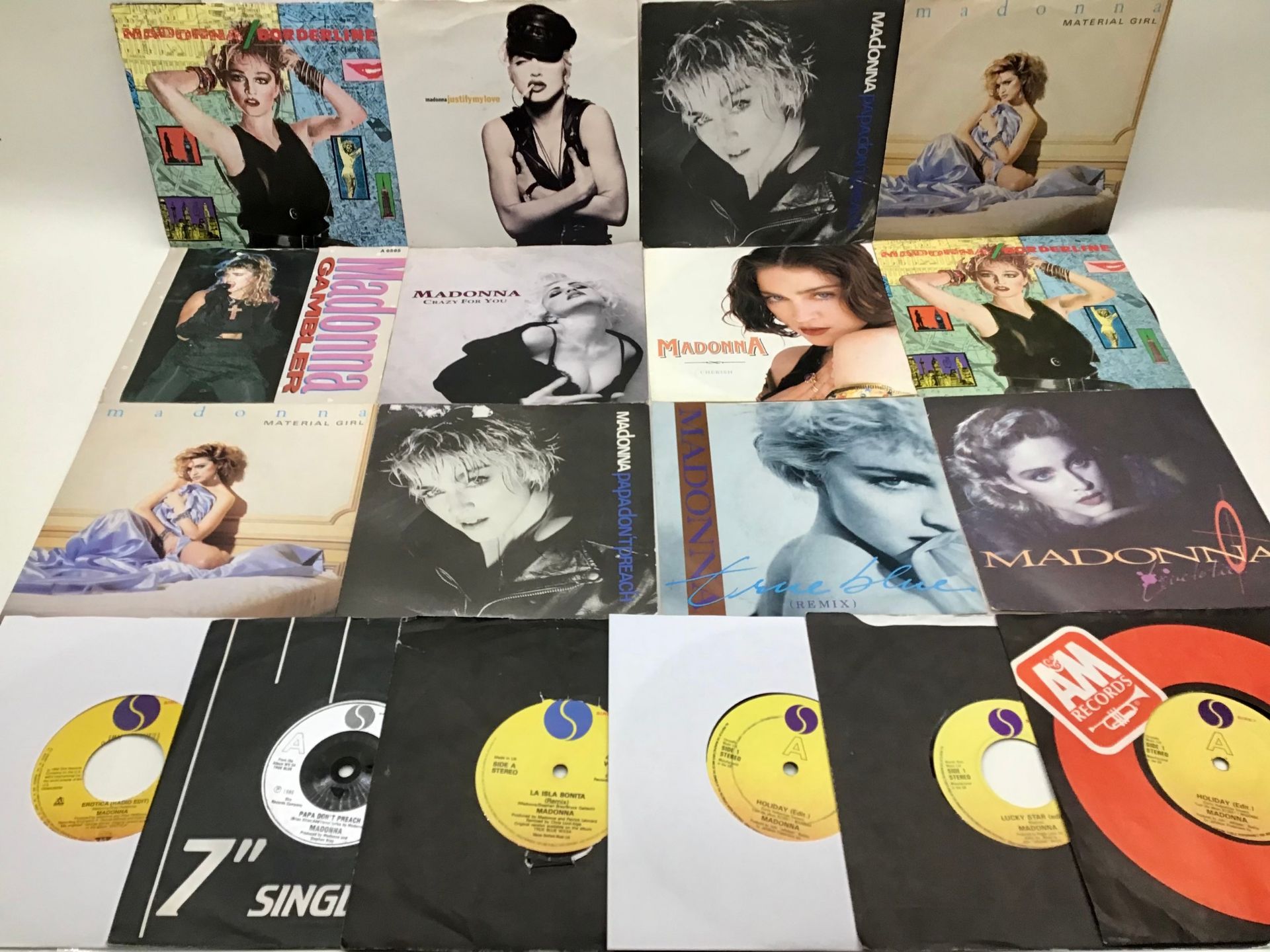 MADONNA COLLECTION OF 7” VINYL SINGLE RECORDS. Nice selection here which includes many picture