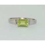 9ct white gold ladies Peridot and diamond shoulders ring size R